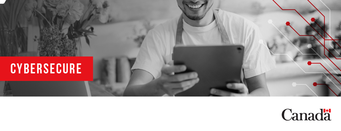 Une photo noir et blanc d’un homme regardant un iPad en souriant. Le logo du gouvernement du Canada est visible, ainsi que le mot « Cyber sécurisé »